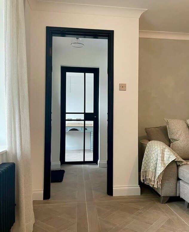 Industrial Doors for a Modern Cottage Living Space
