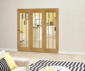 Prefinished Worcester Oak Roomfold Deluxe  Internal Bifold Doors with Clear Glass