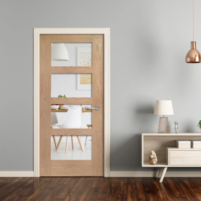 926 x 2040x40mm Shaker 4 Light Oak - Clear Glass Door